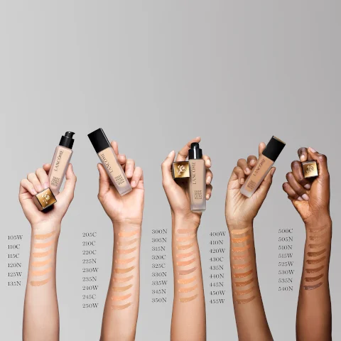Model arm swatches of all the shades that includes 105W,110C,115C,120N,125W,135N,205C,210C,220C,225N,230W,235N,240W,245C,250W,300N,305N,315N,320C,325C,330N,335W,345N,350N,400W,410N,420W,430C,435N,440N,445N,450W,455W,500C,505N,510N,515W,525W,530W,535W and 540N