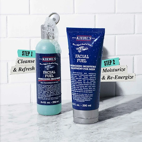 Image 1 - Image shows two Kiehls products on a marble surface: a blue energizing face wash bottle with bubbles and a dark blue tube of energizing moisture treatment, accompanied by labels stating STEP 1 Cleanse & Refresh and STEP 2 Moisturize & Re-Energize.
Image 2 - The image shows two product images on a white background; the left features brown coffee grounds labeled Caffeine with the text Facial Fuel Energizing Face Wash, and the right displays a yellow liquid labeled Vitamin C with the text Facial Fuel Energizing Moisture Treatment.
Image 3 - Image shows a light blue gel-like substance for a face wash at the top and a cream-like moisturizer below, with visible text reading ENERGIZING Face Wash and ENERGIZING Moisturizer.
