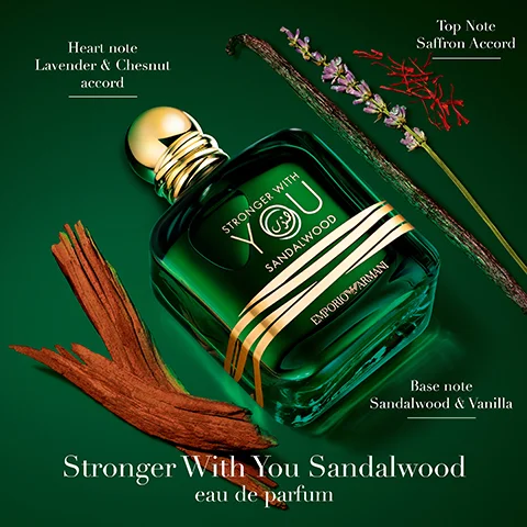 Image 1 - A green bottle of perfume labeled Stronger With You Sandalwood is surrounded by sandalwood sticks, lavender, and other botanical elements, with visible text detailing the fragrance notes: Top Note Saffron Accord, Heart Note Lavender & Chestnut accord, Base Note Sandalwood & Vanilla, and eau de parfum.