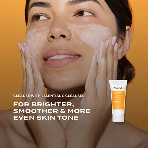 Image 2 - A woman applies cleanser to her face, with a Murad Essential-C Cleanser tube beside her, and the visible text reads CLEANSE WITH ESSENTIAL C CLEANSER FOR BRIGHTER, SMOOTHER & MORE EVEN SKIN TONE Murad. ENVIRONMENTAL SHIELD Essential-C Cleanser Nettoyant Essentiel-C. Image 3 - A woman with a dab of light-colored serum on her cheek looks up and to the right, next to an orange and white bottle of Murad Vita-C Glycolic Serum that reads Murad. Vita-C Glycolic Serum Sérum Glycolique Vita-C, with overlaid text stating TREAT WITH VITA-C GLYCOLIC SERUM FOR BRIGHTER, SMOOTHER SKIN IN JUST 2 WEEKS* and a smaller note *Proven results reported by trial participants in a 2-week clinical study, using Murad Vita-C Glycolic Serum. Image 4 - A woman with dark curly hair has a dab of light cream on her cheek, looking up and to the left, with a white Murad Essential-C Firming Radiance Day Cream jar, accompanied by the text MOISTURISE WITH ESSENTIAL-C FIRMING RADIANCE DAY CREAM FOR IMMEDIATE HYDRATION & BRIGHTER SKIN IN JUST 4 WEEKS* and a disclaimer *Results reported by trial participants in a 4-week clinical study. Image 5 - A side-by-side comparison of a persons face shows the skin on the cheek and nose area before and after using a product, demonstrating a reduction in dark spots and improvement in skin texture in the after image, Before Vita-C Glycolic Serum After 4 weeks. Image 6 - An infographic on an orange background titled HOW TO USE OUR RADIANT SKIN DISCOVERY KIT displays a three-step routine: 01 CLEANSE with a tube of Murad Environmental Shield Essential-C Cleanser, 02 TREAT with a bottle of Murad Vita-C Glycolic Serum, and 03 MOISTURISE with a jar of Murad Essential-C Firming Radiance Day Cream, with sun and moon icons indicating use times for each step.