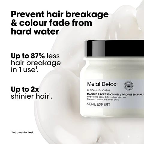 Image 1 - A white jar of hair mask with a black lid is partially submerged in a white creamy substance, with text reading Prevent hair breakage & colour fade from hard water, Up to 87% less hair breakage in 1 use¹, Up to 2x shinier hair¹, Metal Detox, GLICOAMINE + IONÈNE, MASQUE PROFESSIONNEL / PROFESSIONAL MASK, Empêche la casse & la couleur de virer, Prevents breakage & color shift, SERIE EXPERT, INNOVATIVE TECHNOLOGY PATENT PENDING, and ¹ Intrumental test. Image 2 - A dark image depicts strands resembling hair with small metallic particles adhering to them, with text that reads: #MetalDetox Did you know that wash after wash, metal penetrates inside your hair? LOREAL PROFESSIONNEL PARIS. Image 3 - A translucent, irregular spherical object containing crumpled bronze metallic material is set against a black background, with visible text that reads THE TECH Glicoamine Traps and neutralises metal inside the fibre. Inside the fibre. It removes metal particles from hair. Image 4 - This image features three sets of before and after comparisons showing improved hair health and appearance for different hair types, with a collection of LOréal Professionnel Metal Detox products, and includes the visible text Before, After, Not retouched, and The full Metal Detox routine for all damaged hair. Image 5 - The image displays a LOréal Professionnel Metal Detox three-step hair care routine featuring a white shampoo bottle, a white mask jar, and an amber serum bottle, all shown with swatches of their respective textures, alongside the visible text The anti-breakage professional routine, 01 Cleanse, 02 Moisturize, 03 Strengthen, and product titles PROFESSIONAL SHAMPOO, PROFESSIONAL MASK, and ANTI-METAL CONCENTRATE. Image 6 - A white jar of LOréal Professionnel Metal Detox hair mask is centered, surrounded by green citrus fruits, white flowers, and liquid elements, with text labels indicating its fragrance notes. The visible text reads: The fragrance. Salty bergamot. Grapefruit flower. Guaiac wood. Metal Detox Sans Sulfate + Crème Masque Professionnel / Professional Mask Préserve le masque et la couleur Prevents breakage & color shift LOréal Professionnel Serie Expert 150 ml 5.07 FL OZ. Image 7 - A hand holds a dollop of white mask or cream in its palm, with the text Apply a dollop of mask evenly on lengths to ends.